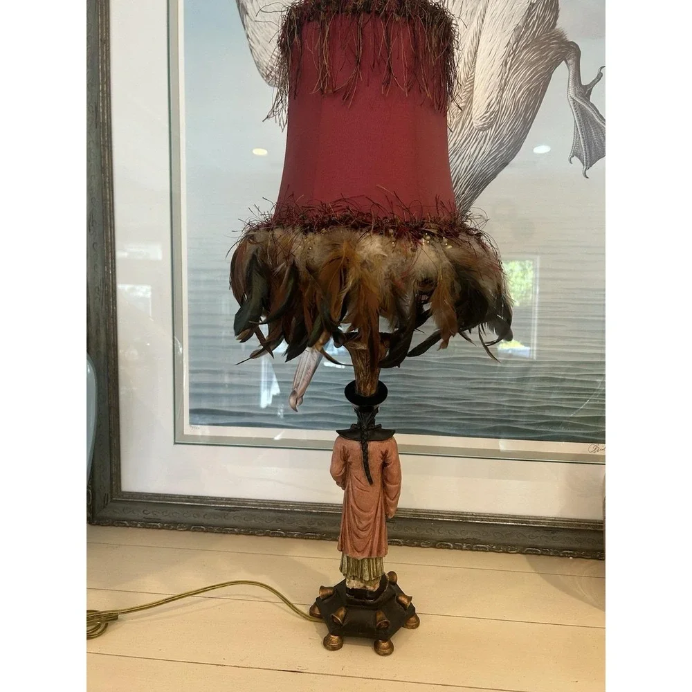 Chinoiserie-style Asian man table lamp manufactured by Berman W/feather shade